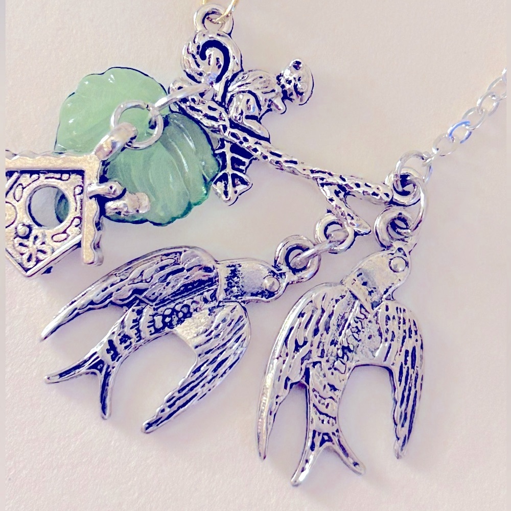 NWOT Necklace Lovebirds, Birdhouse, Squirrel on branch, green Leaf charms 18”
